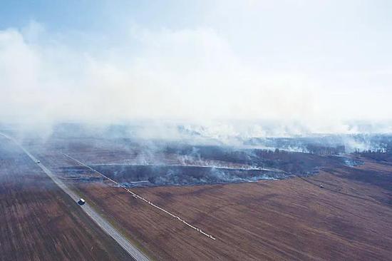 今年北极圈火灾释放二氧化碳量创纪录。&nbsp;图片来源：Kirill Kukhmar/TASS/Getty